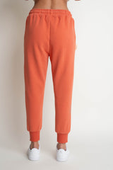 ORANGE JOGGER SWEATPANTS - BEGERA
